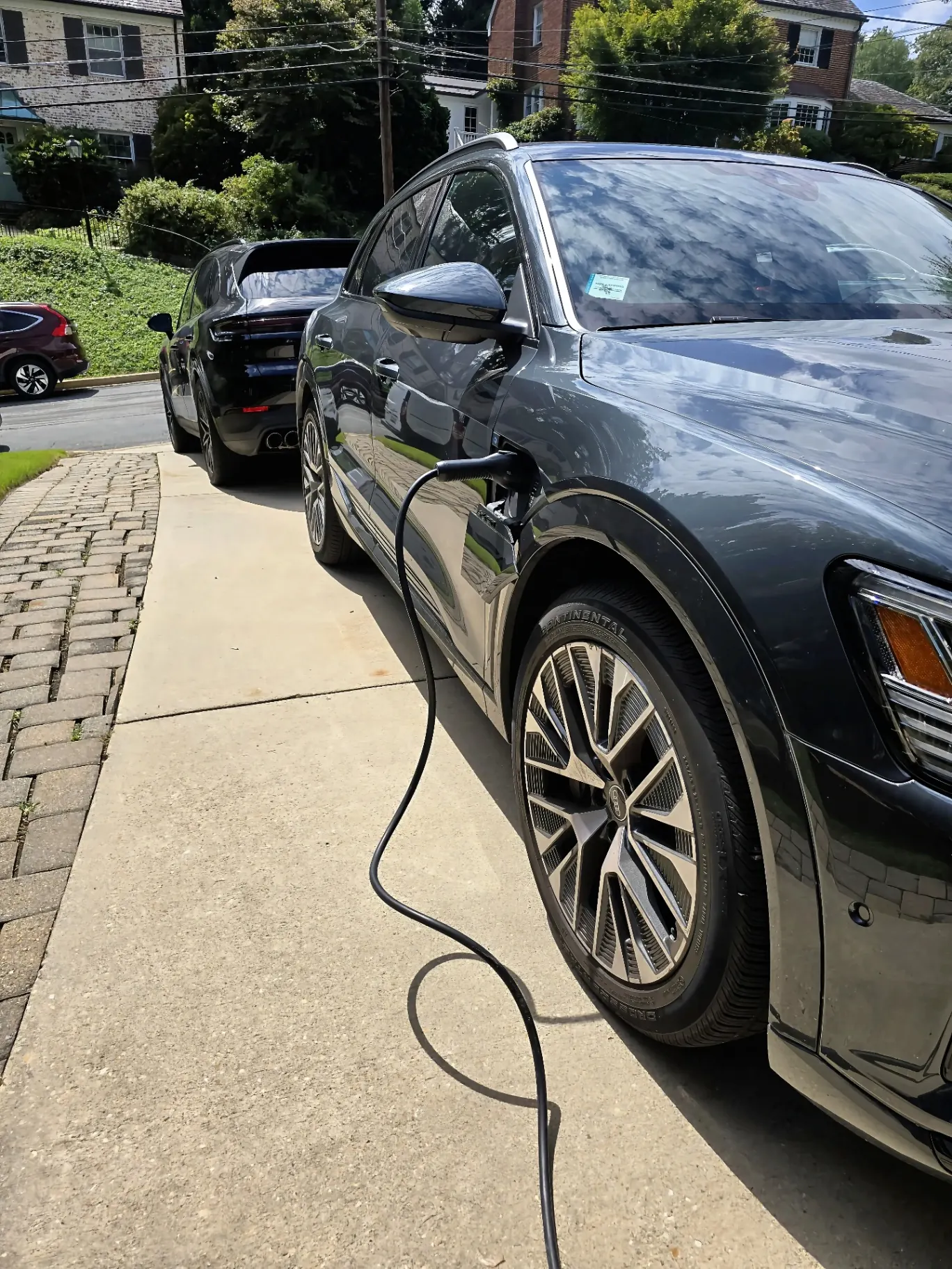 Residential EV Charging — Audi e-tron — Home Level 2 charger commissioned and live with a customer's Audi e-tron in the driveway.