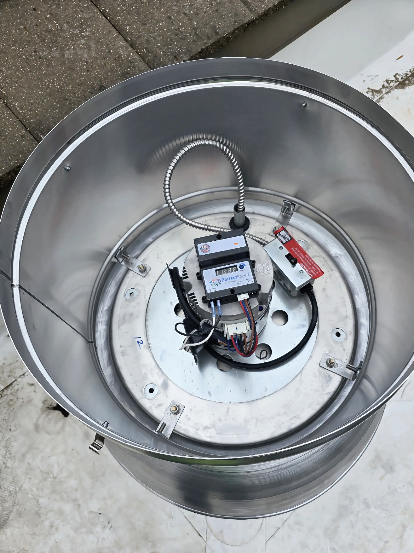Exhaust Fan & PerfectSpeed Controller — Commercial exhaust fan tied into a variable-speed controller for tuned ventilation.