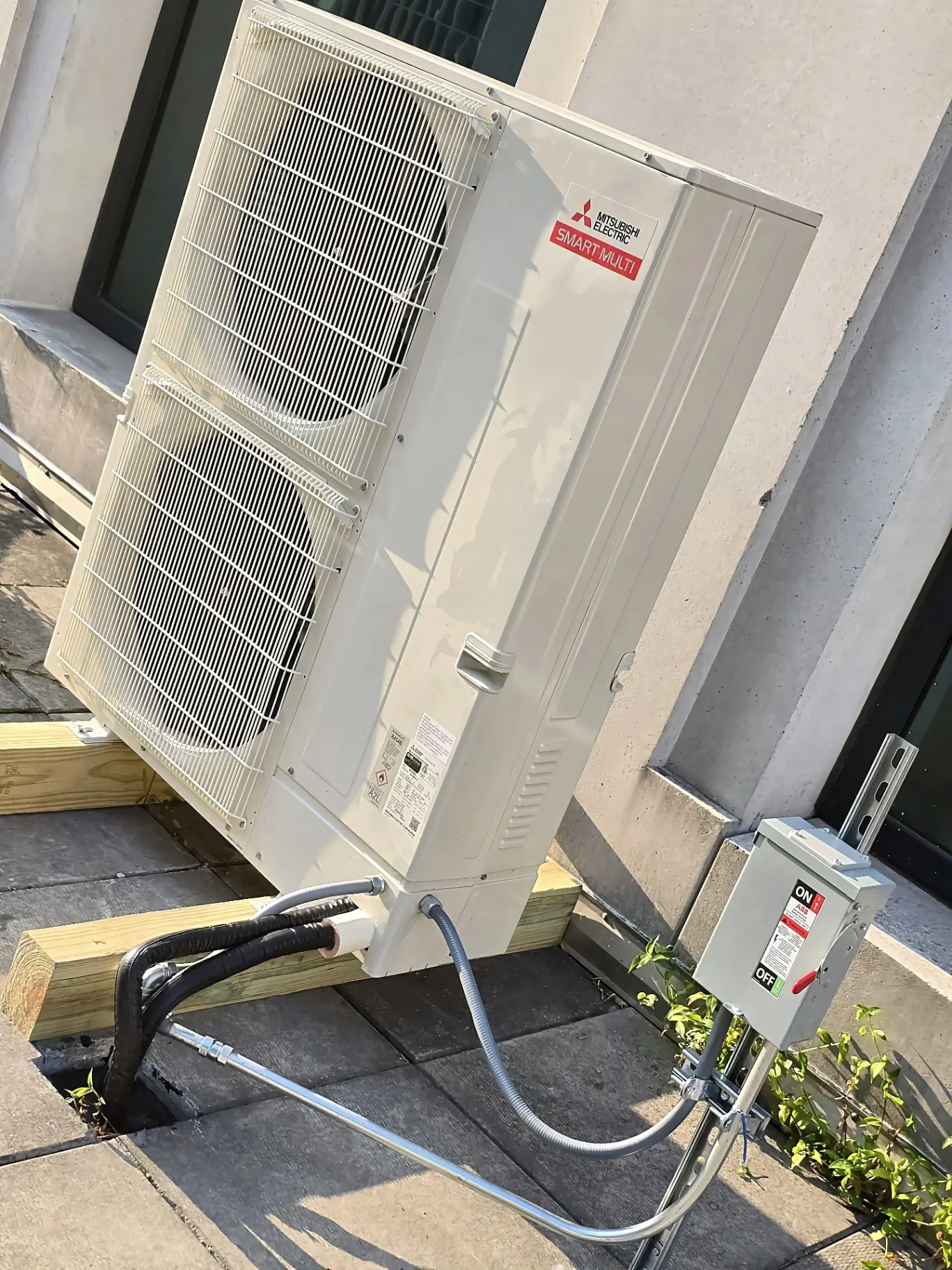 Mitsubishi Smart Multi Heat Pump — Disconnect and feed wired for a Mitsubishi multi-zone heat pump system — labeled, sealed, inspection-ready.